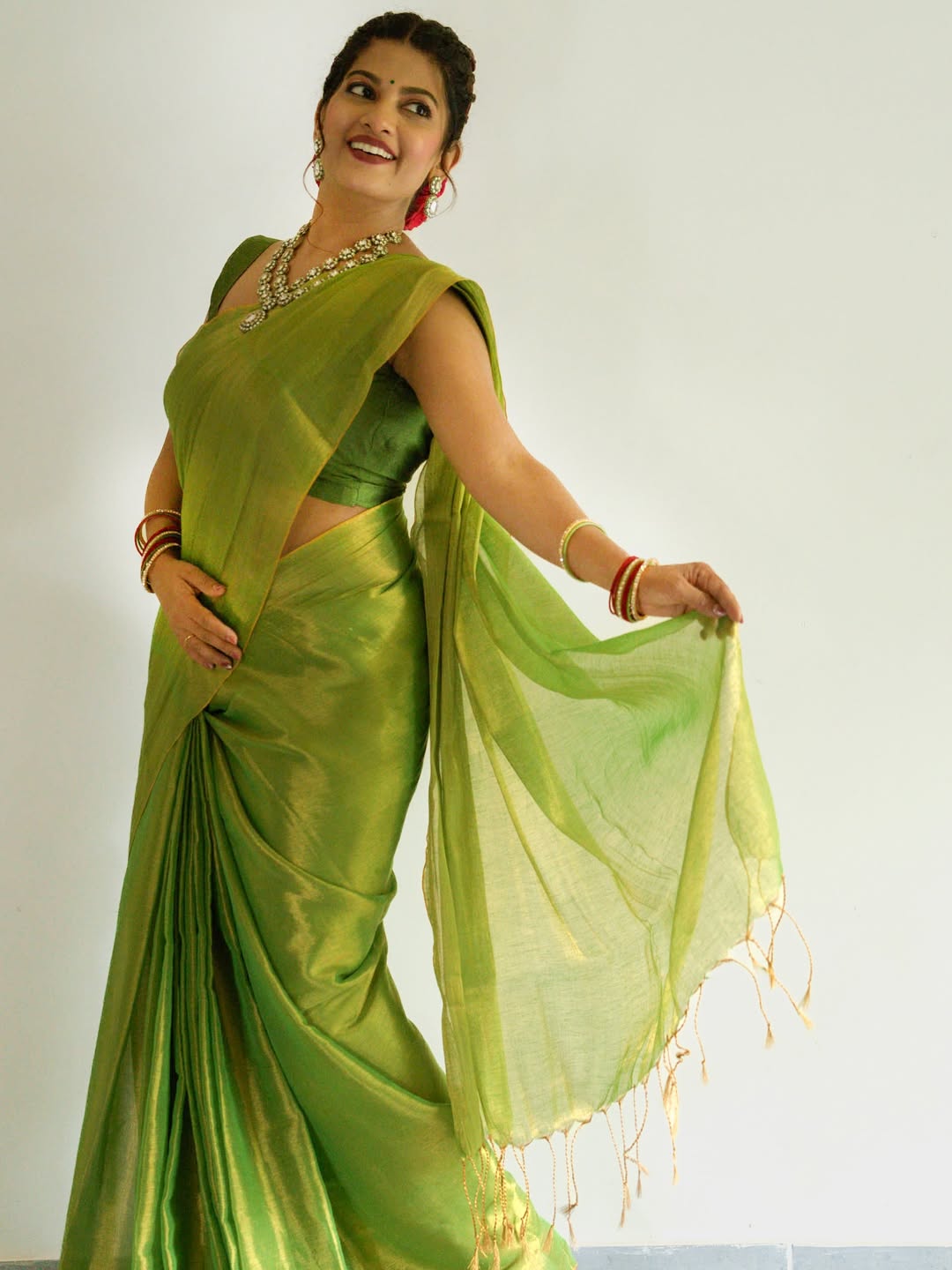 Dhanshri kadgaonkar green tissue silk saree traditional look photoshoot