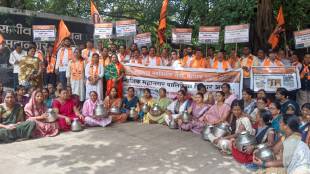 MNS staged a protest by taking out a pot bellied protest at the Nashik Municipal Corporation headquarters