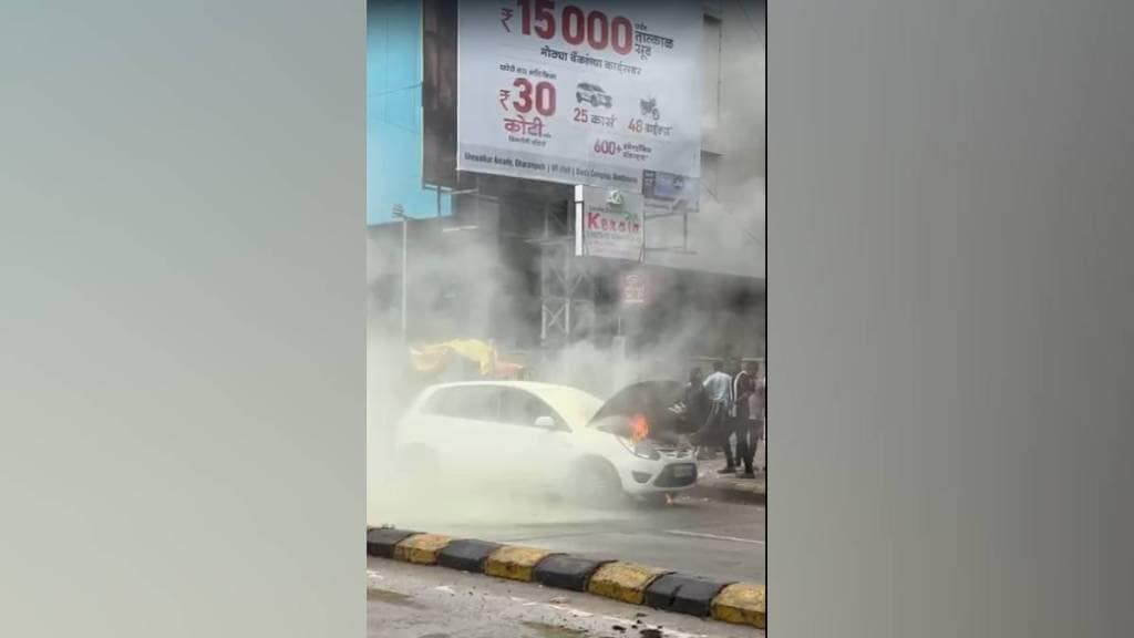 Car engine caught fire in dharampet passengers