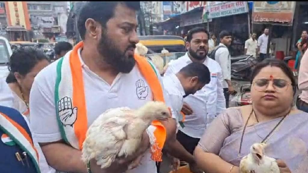 various groups protested on friday against Kalyan dombivli municipality with chickens over ban non veg sale