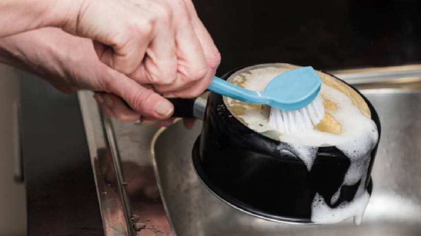 how to clean blackened Kadai