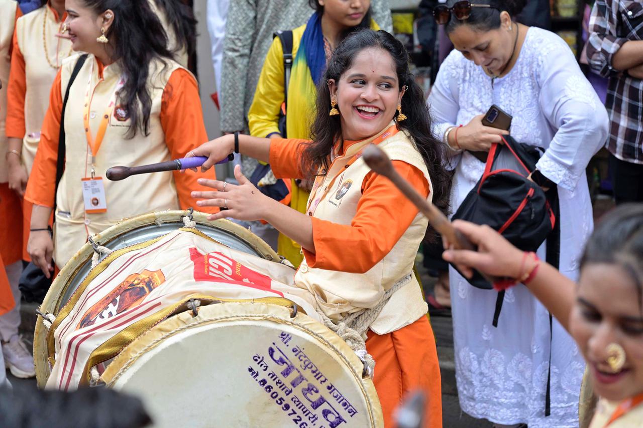 On the occasion of Ganesh Chaturthi today, the processions of the city's Manache Ganpati and other Ganesh mandals, took place with great enthusiasm and vibrancy, accompanied by the beats of dhols and tashas, along Laxmi Road