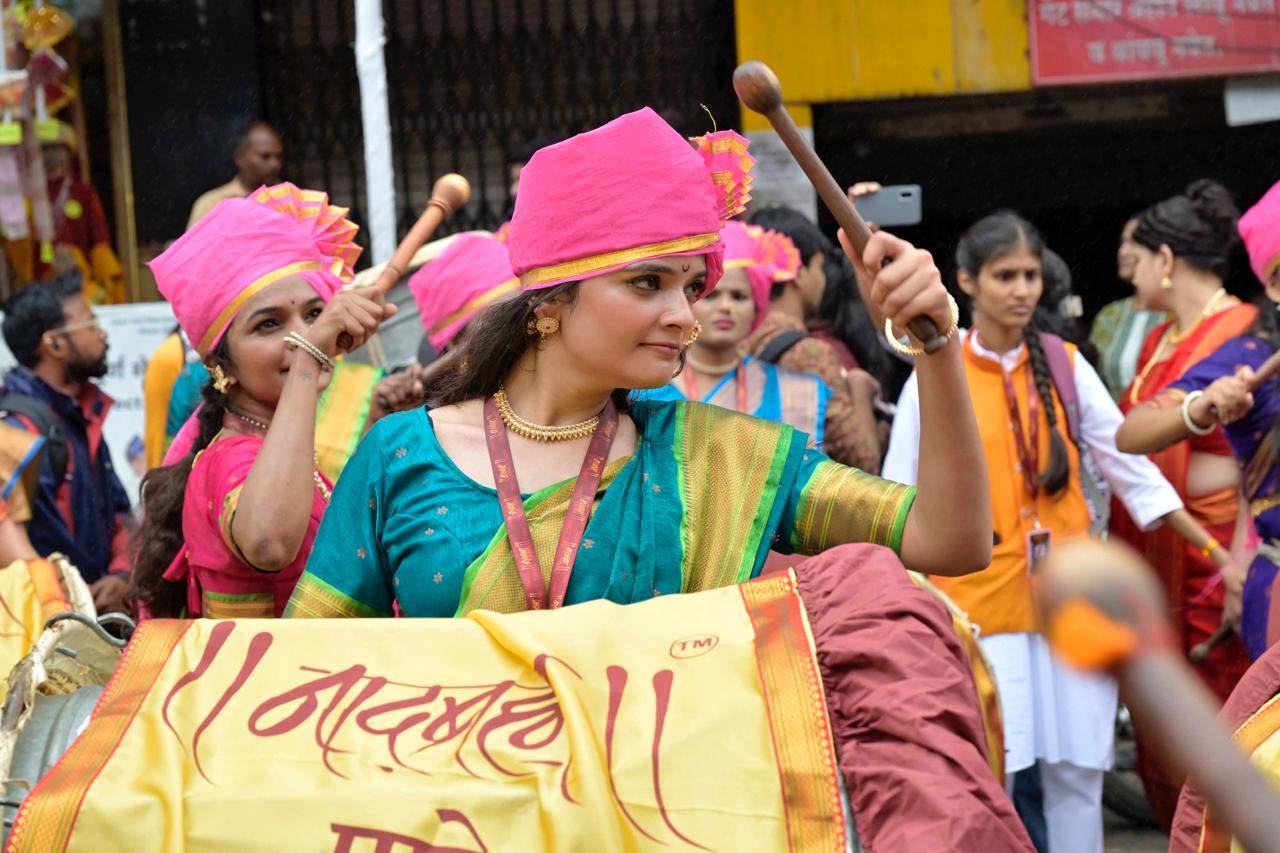 On the occasion of Ganesh Chaturthi today, the processions of the city's Manache Ganpati and other Ganesh mandals, took place with great enthusiasm and vibrancy, accompanied by the beats of dhols and tashas, along Laxmi Road