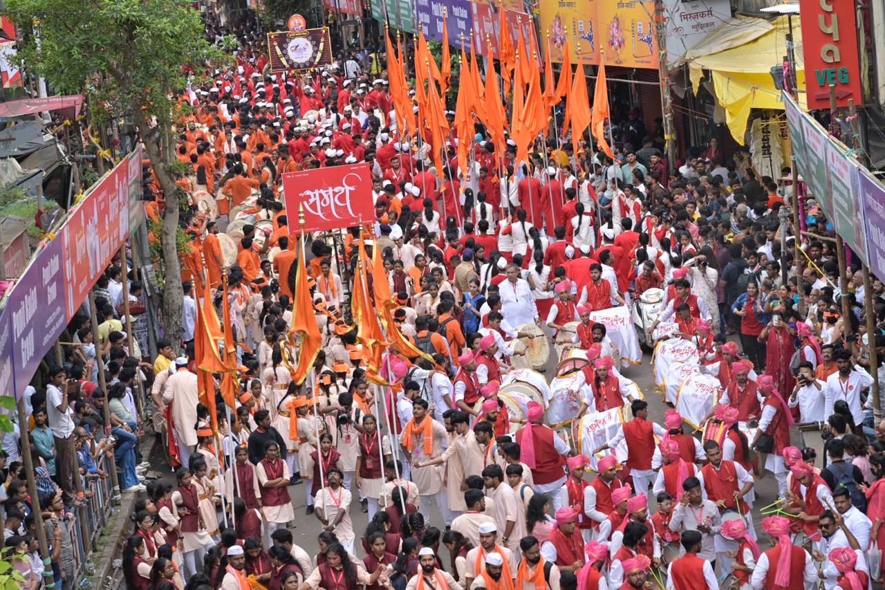 On the occasion of Ganesh Chaturthi today, the processions of the city's Manache Ganpati and other Ganesh mandals, took place with great enthusiasm and vibrancy, accompanied by the beats of dhols and tashas, along Laxmi Road
