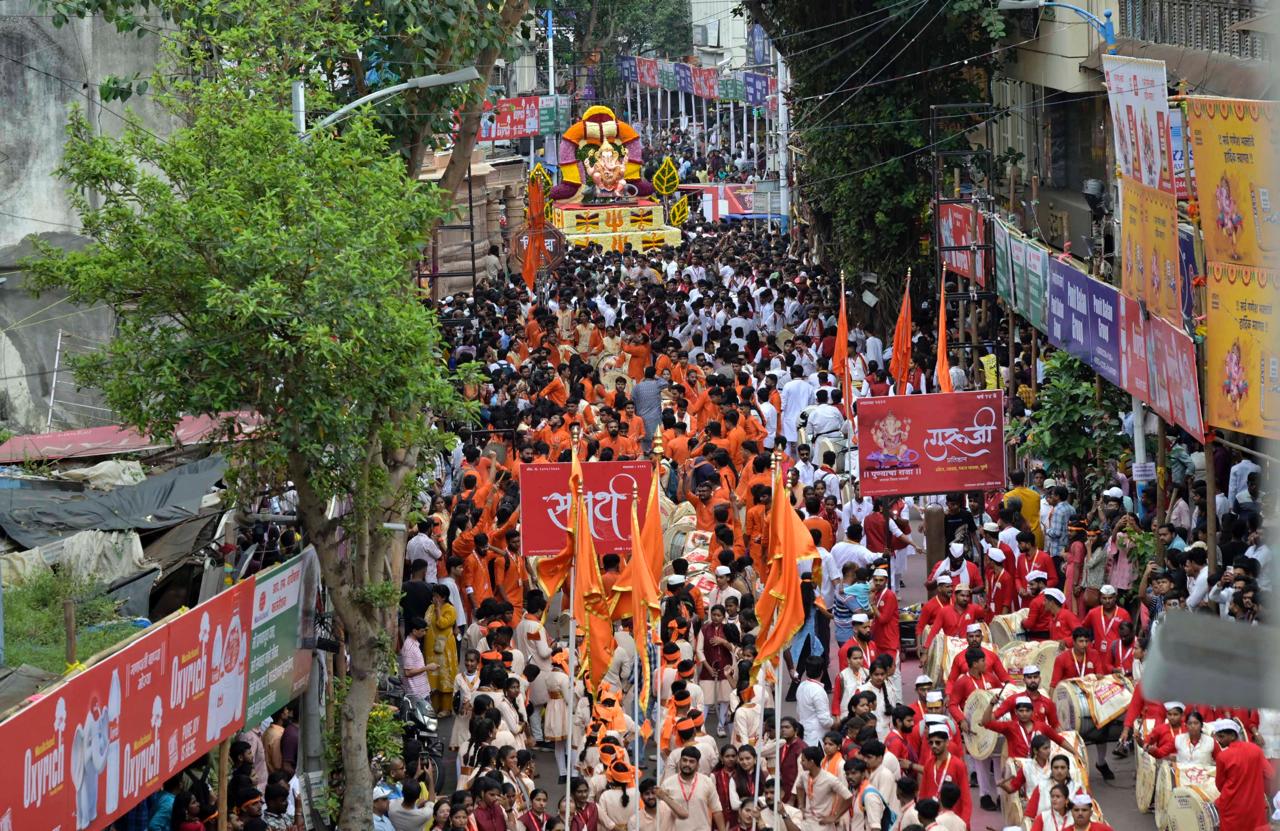 On the occasion of Ganesh Chaturthi today, the processions of the city's Manache Ganpati and other Ganesh mandals, took place with great enthusiasm and vibrancy, accompanied by the beats of dhols and tashas, along Laxmi Road