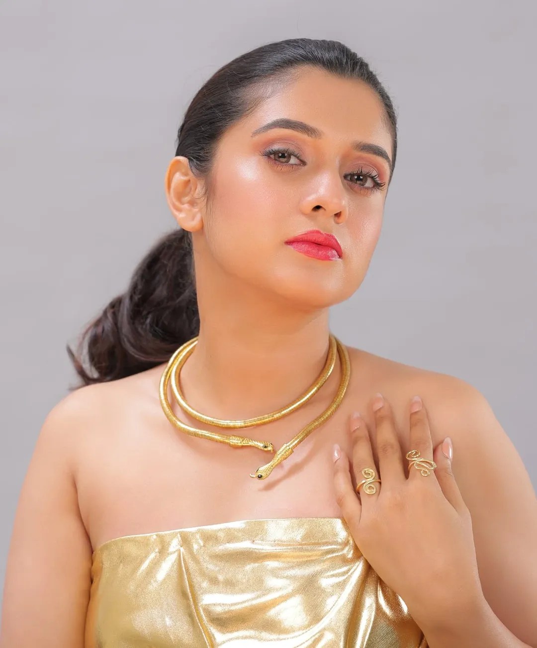 Vaishnavi Kalyankar Gaikwad Golden Off-Shoulder Dress