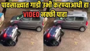 Car Sinks in Road India Monsoon