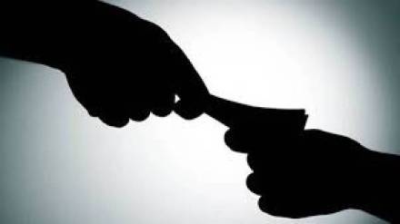 Anti Corruption Department caught Vijay Gawli a city survey clerk at the Kalvan Land Records Office while accepting a bribe