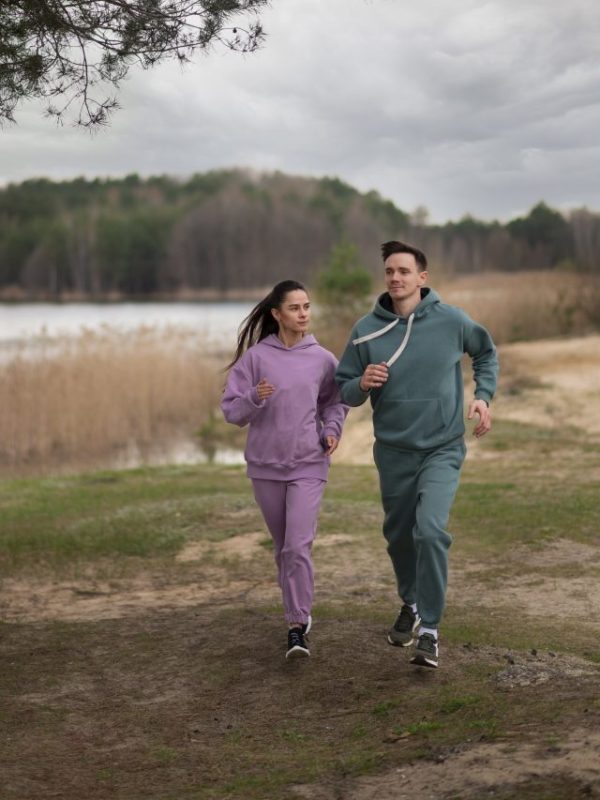 full-shot-couple-running-together