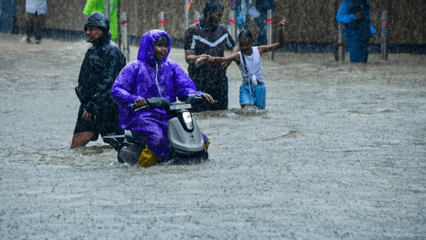 Heavy rainfall, flooded roads, and traffic chaos bring the city to a standstill | In Pictures 