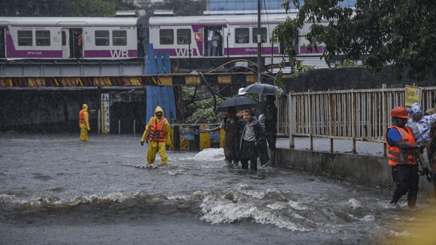 Heavy rainfall, flooded roads, and traffic chaos bring the city to a standstill | In Pictures 