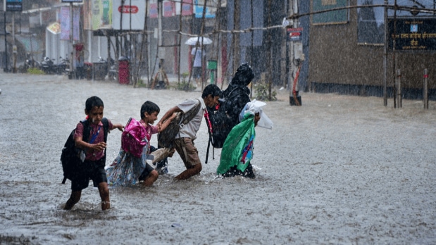 Heavy rainfall, flooded roads, and traffic chaos bring the city to a standstill | In Pictures 