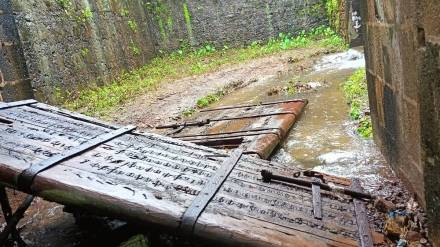 door of the historic Vasai Fort was washed away due to rain