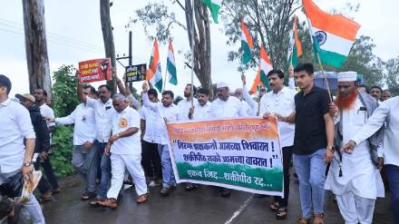 flag hoisted in the field against Shaktipeeth in kolhapur
