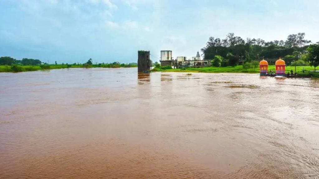 Hundreds of acres of crops are under water as the Krishna Warna river overflows its banks