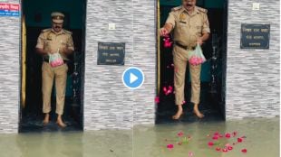 police offers milk and flowers to floodwater entering his home in prayagraj UP video goes viral marathi new