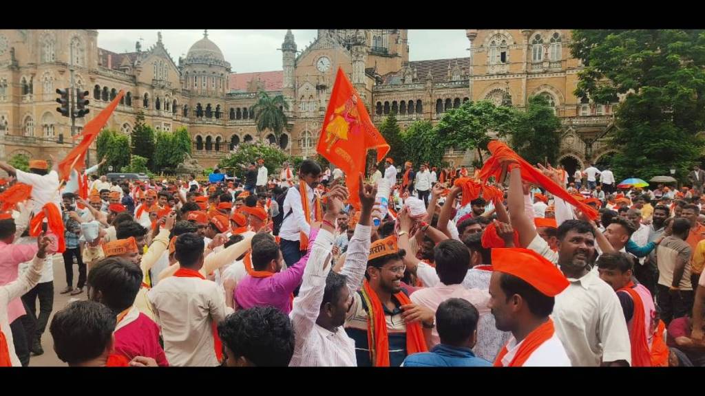 Maratha protesters sit in front of the municipal office
