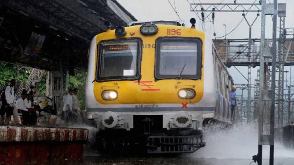 heavy rain in mumbai local train services delayed