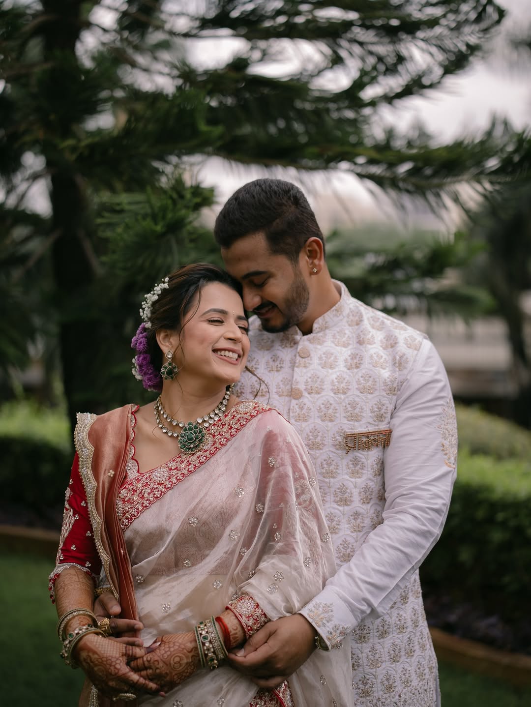 prajakta gaikwad royal engagement photos actress designer blouse with husband