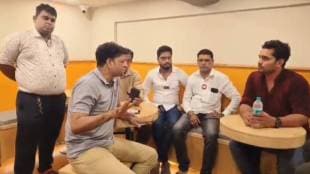 MNS office bearers Arun Jambhale, Harish Patil and others interacting with the cafe owner