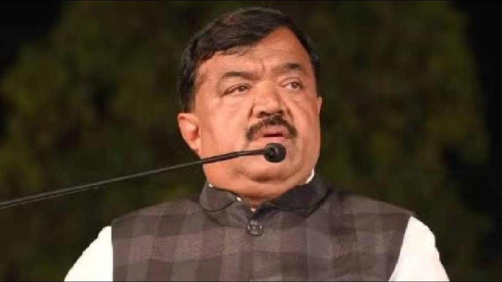 Who is Sudhakar Badgujar upset with in front of Girish Mahajan?