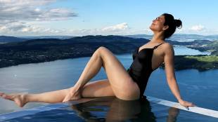 Karishma tanna Switzerland vacation Black bikini Swimsuit look pool photoshoot