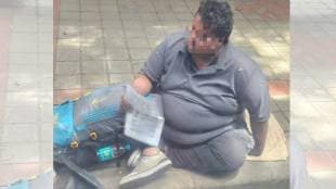 Man With 14 Years Of Experience Sits On Footpath