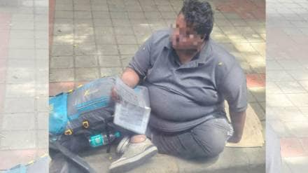 Man With 14 Years Of Experience Sits On Footpath