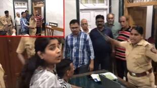 female police officer threw a nameplate at a young woman