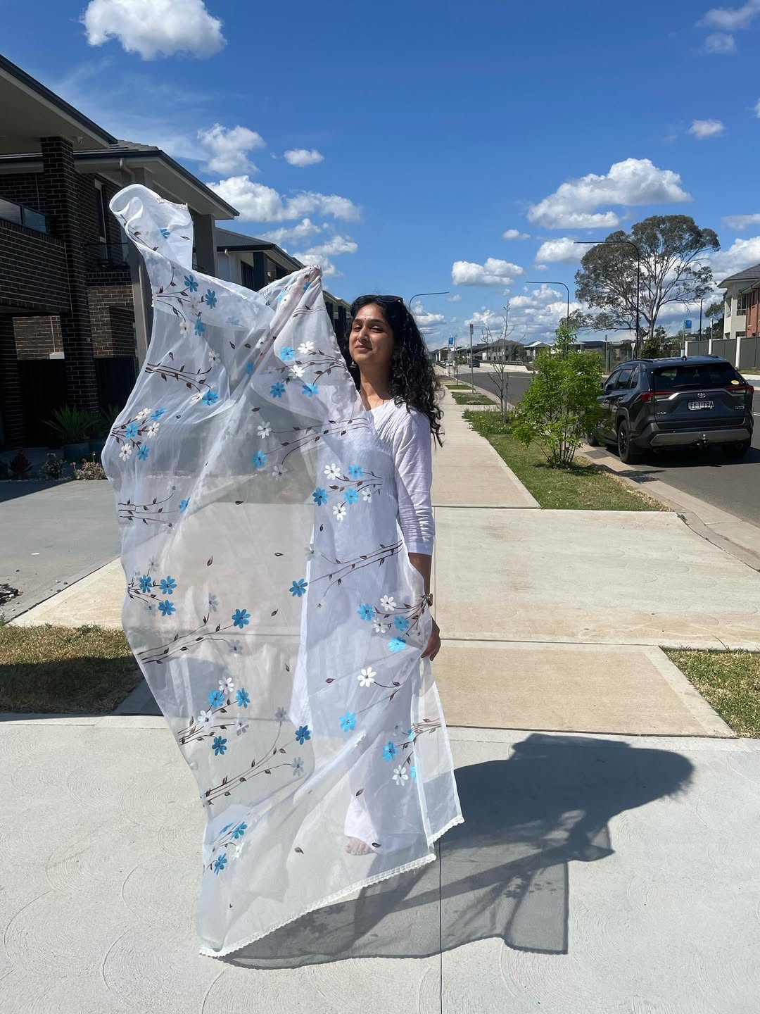 Priyadarshini Indalkar Playing with beautiful Odhani in Sidney vacation white dress looka