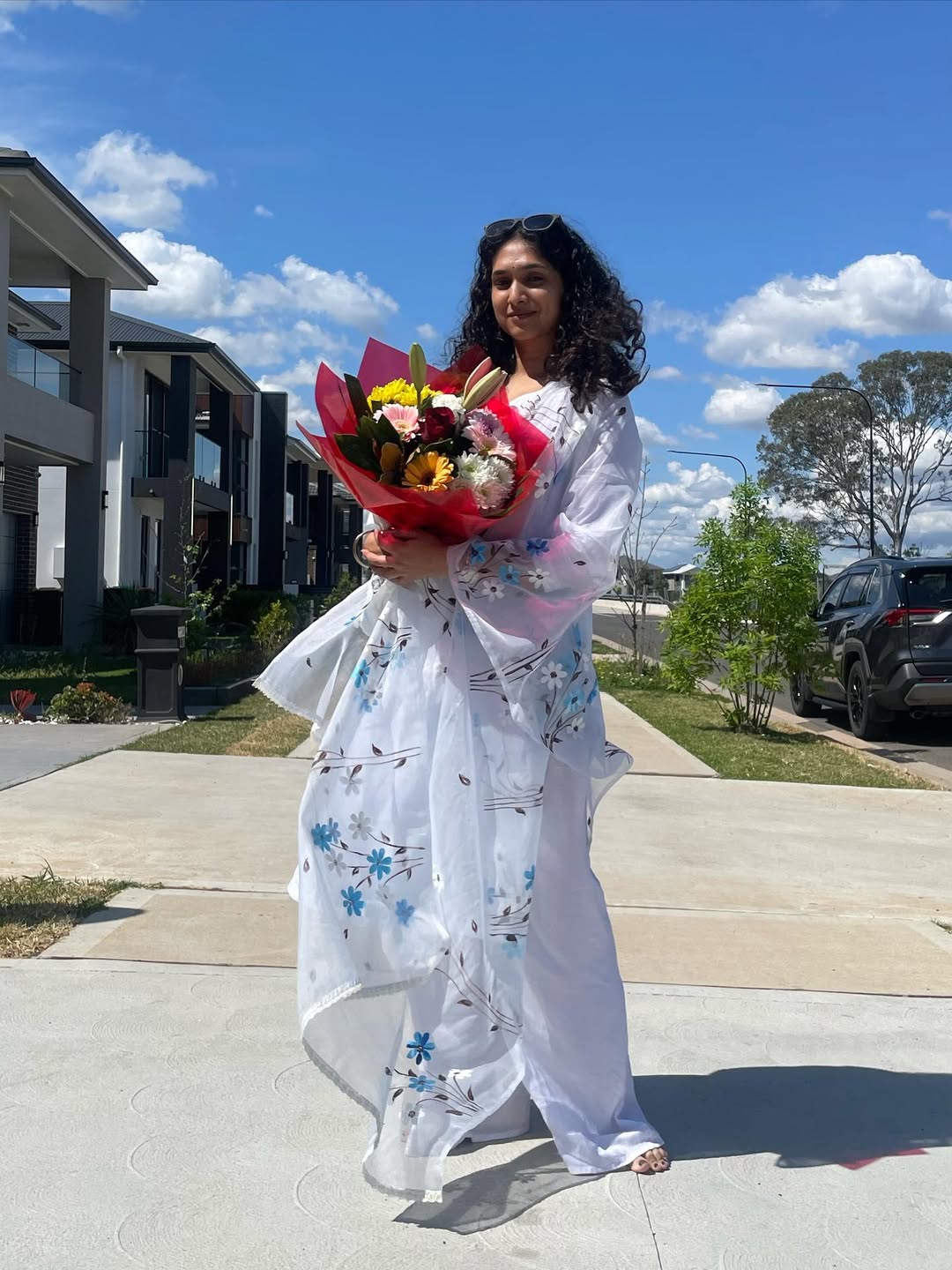 Priyadarshini Indalkar Playing with beautiful Odhani in Sidney vacation white dress looka