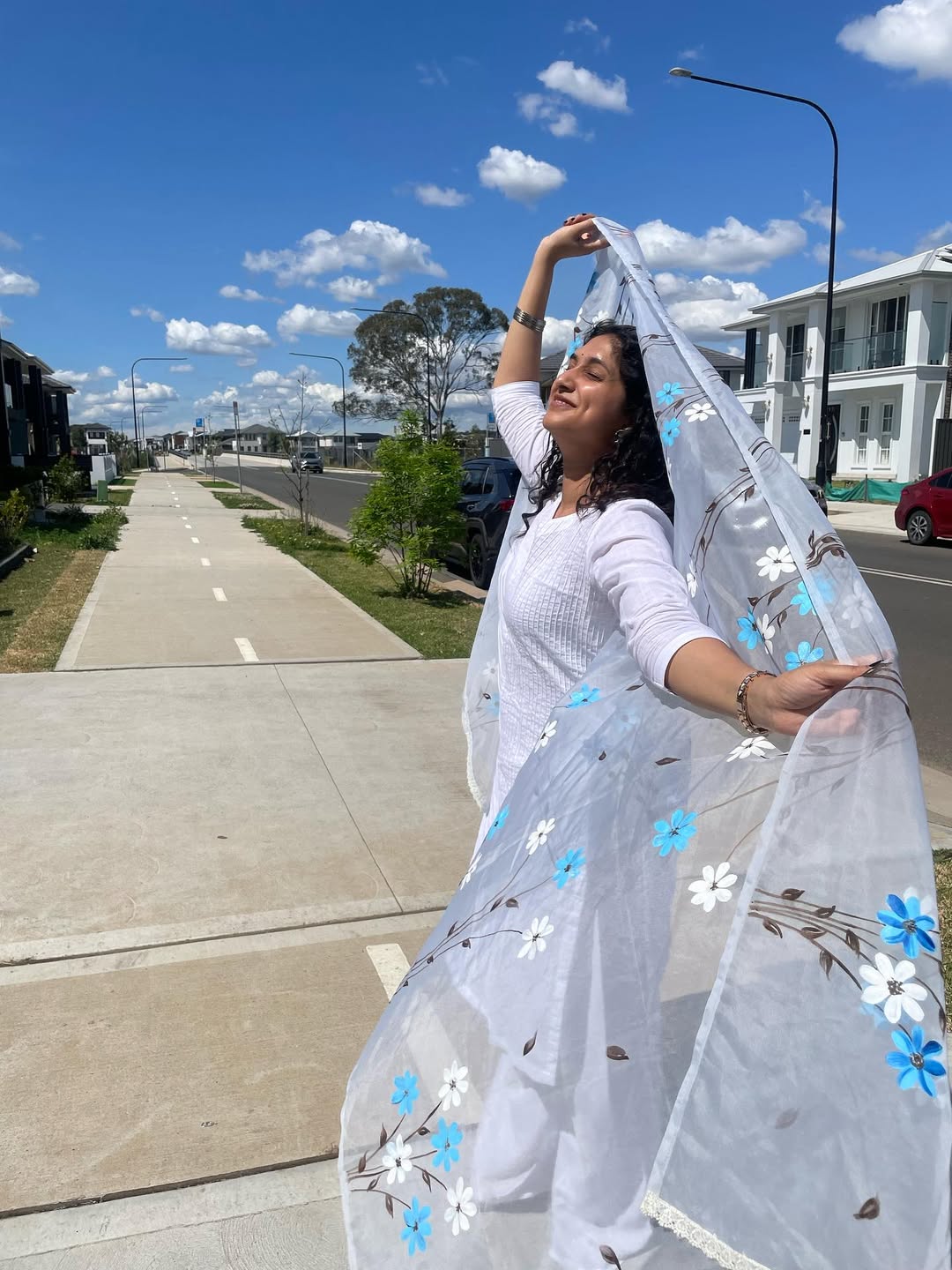 Priyadarshini Indalkar Playing with beautiful Odhani in Sidney vacation white dress looka