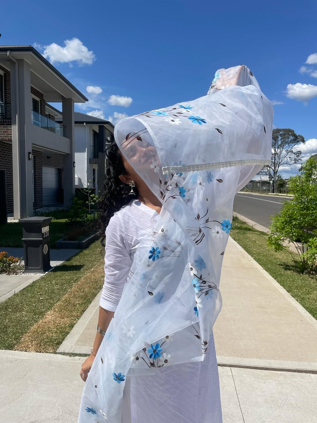 Priyadarshini Indalkar Playing with beautiful Odhani in Sidney vacation white dress looka