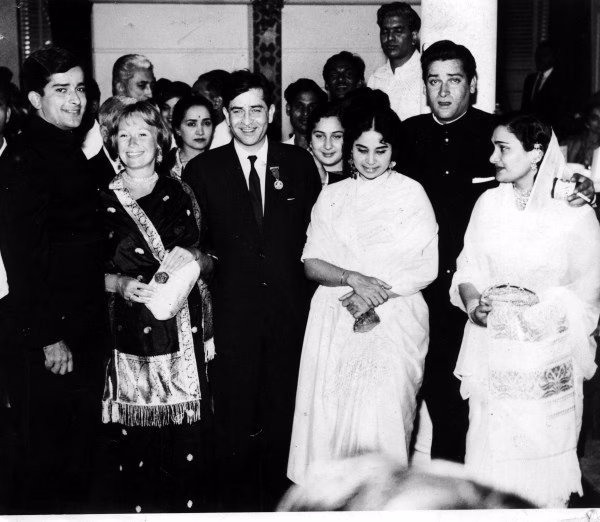 Photographed at the function with them are the wives of the three brothers Krishna Kapoor, Geeta Bali and Jenifer standing near Raj Kapoor is his daughter Ritu (only face visible). Express archive photo on 05.12.1961