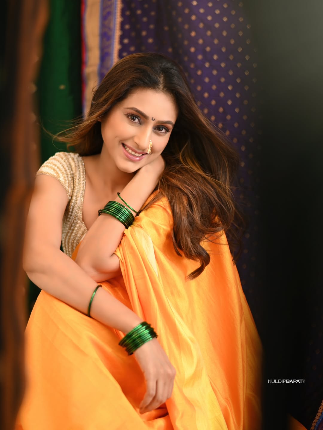 Reshma Shinde in orange color saree beautiful look