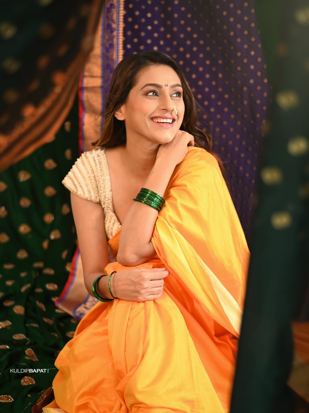 Reshma Shinde in orange color saree beautiful look