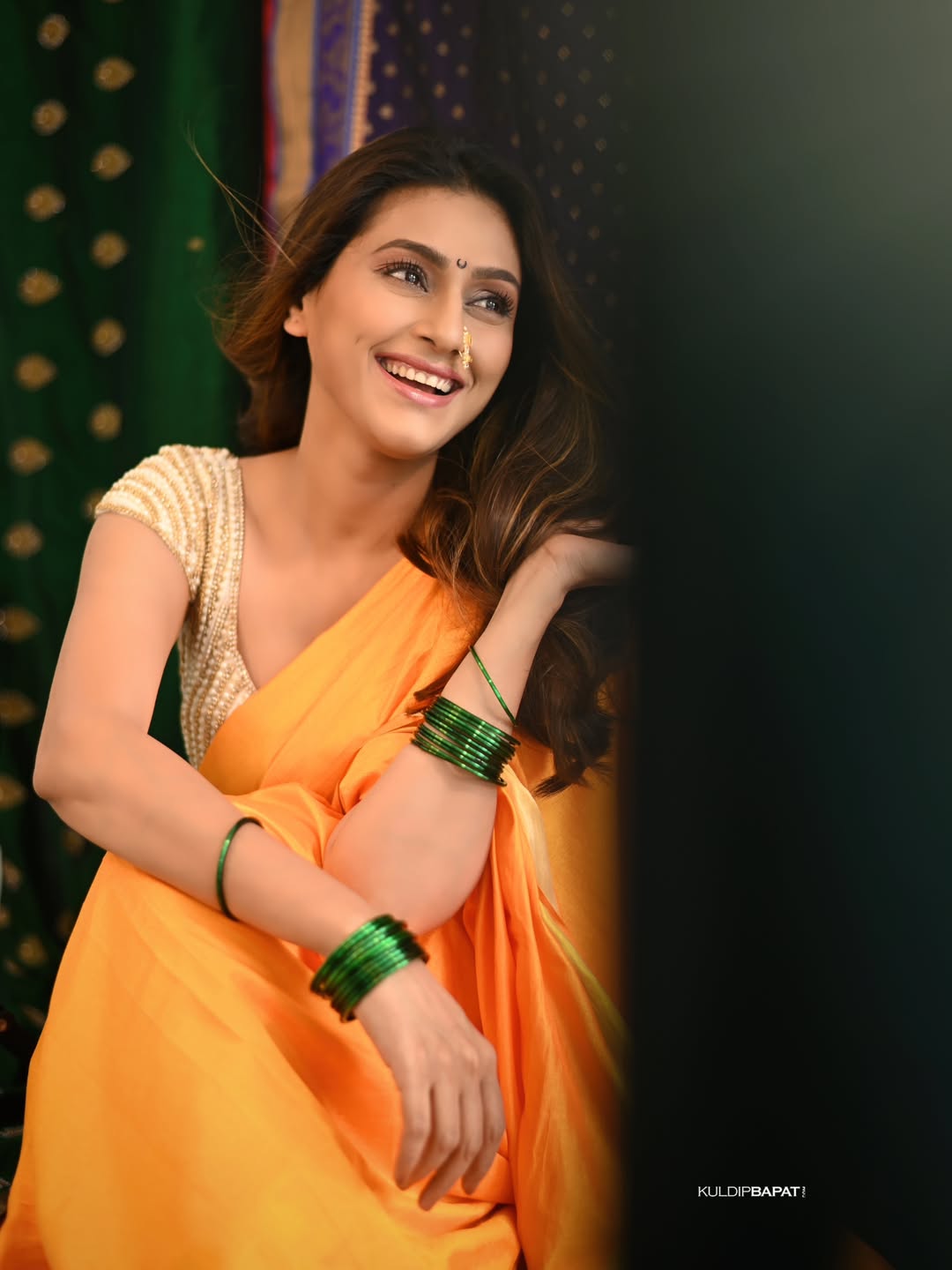 Reshma Shinde in orange color saree beautiful look