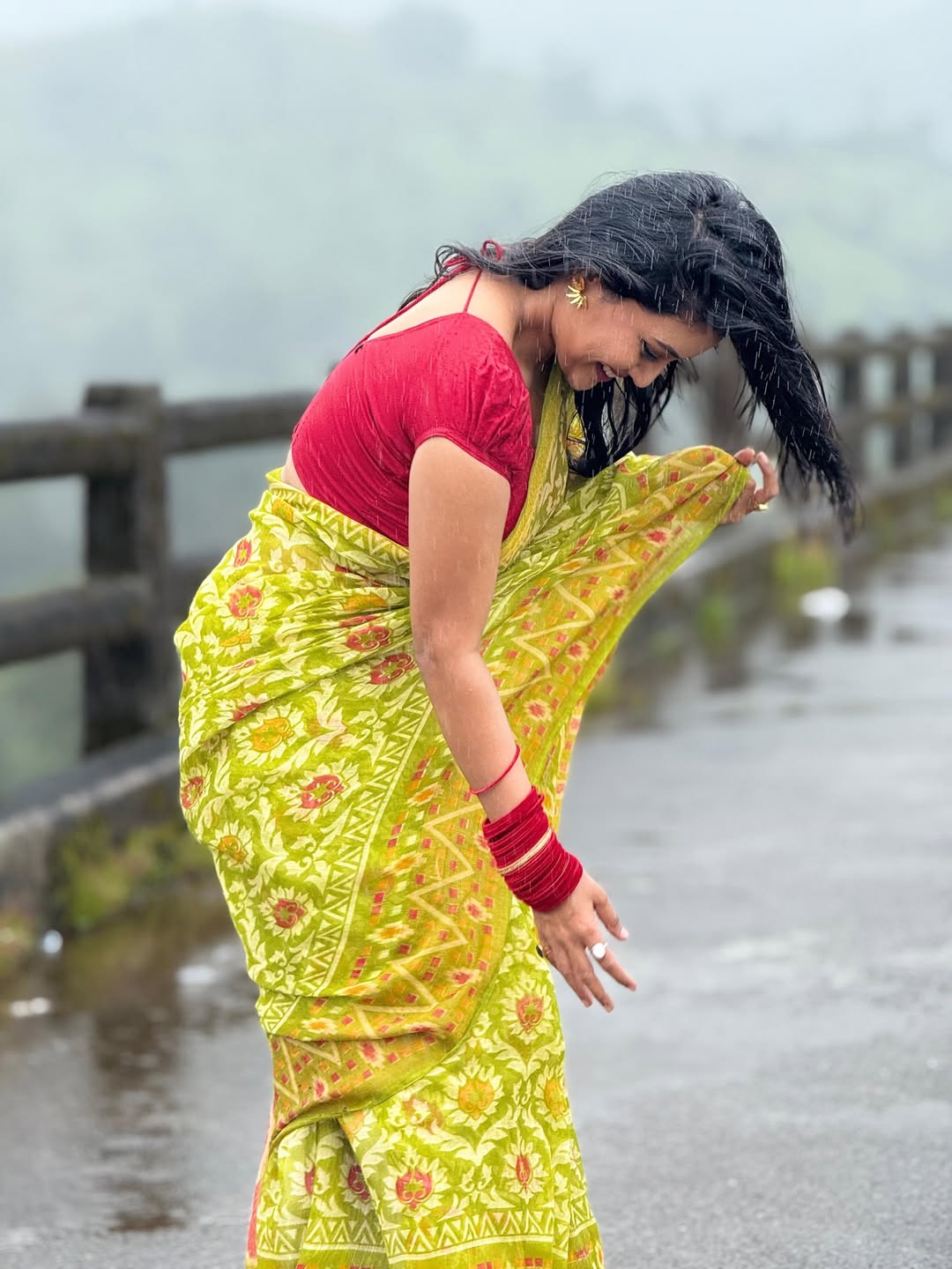 Sonali Patil romantic photoshoot in rain wearing beautiful saree
