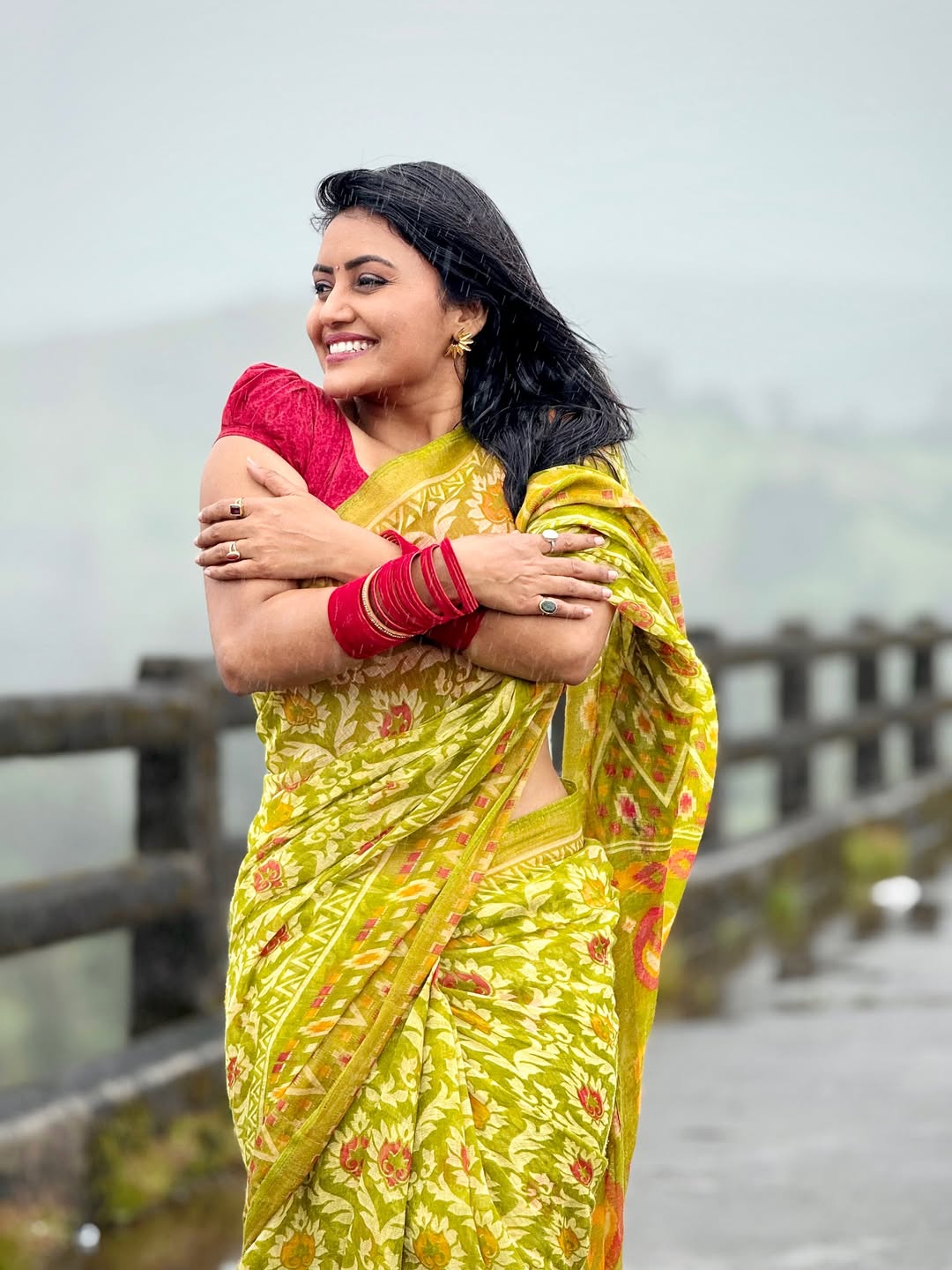 Sonali Patil romantic photoshoot in rain wearing beautiful saree