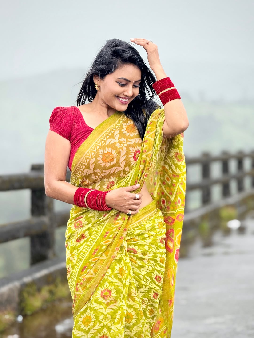 Sonali Patil romantic photoshoot in rain wearing beautiful saree