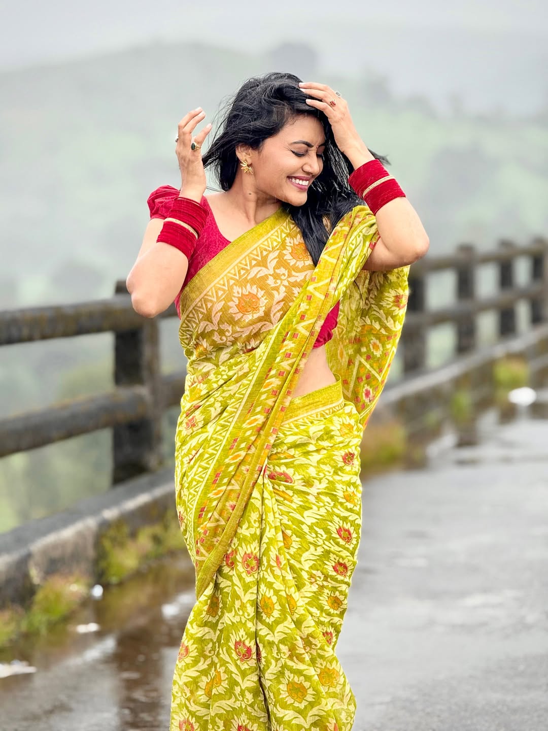 Sonali Patil romantic photoshoot in rain wearing beautiful saree