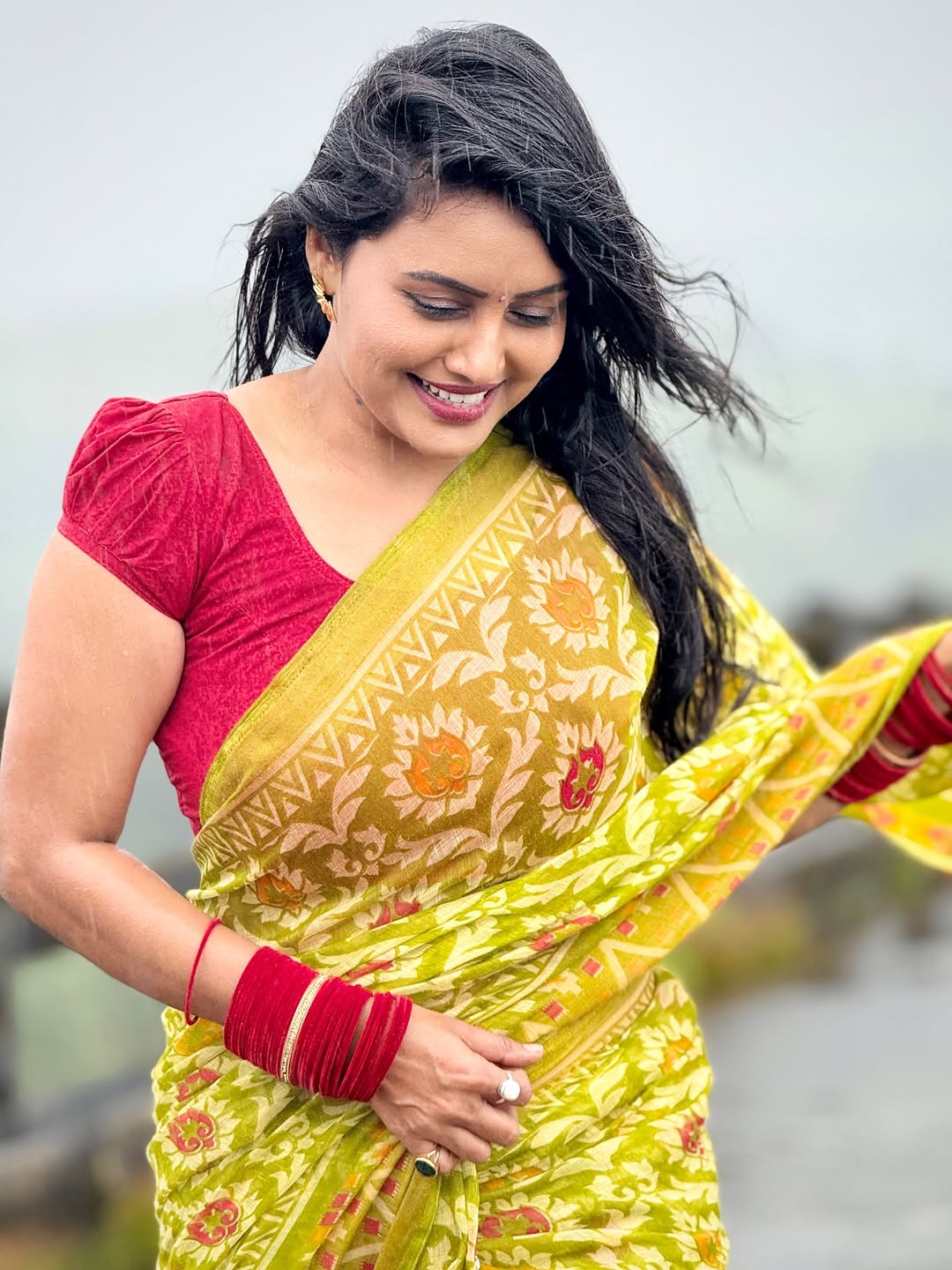 Sonali Patil romantic photoshoot in rain wearing beautiful saree