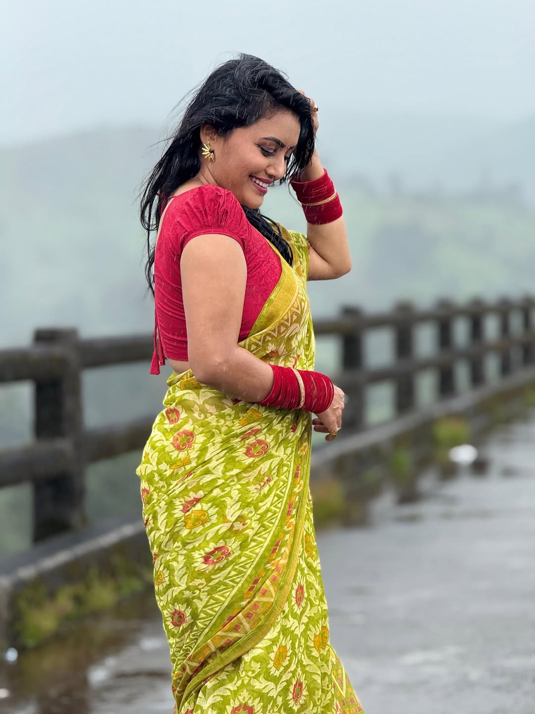 Sonali Patil romantic photoshoot in rain wearing beautiful saree