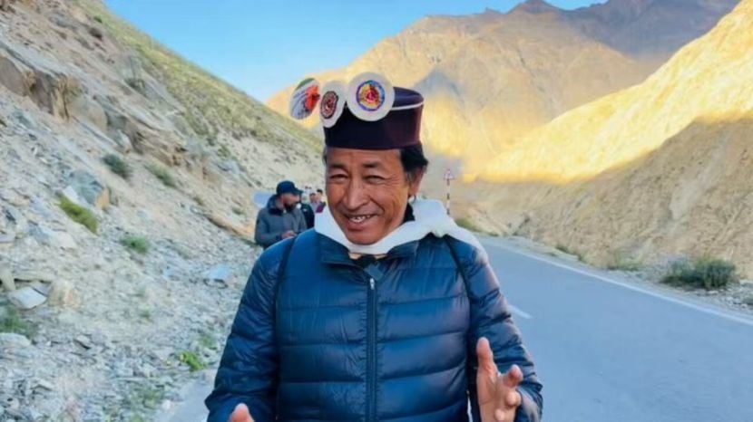 Sonam Wangchuk standing in Ladakh with mountains in the background, educational reformer behind 3 Idiots