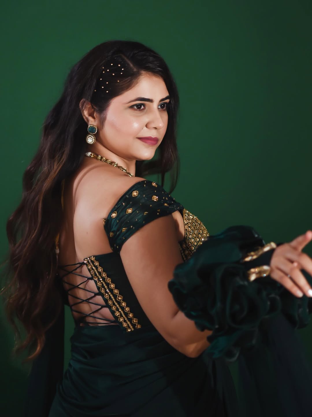 Veena jagtap stylish photoshoot in green saree