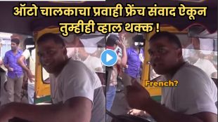 Indian auto rickshaw driver speaking fluent French to foreign tourist inside auto