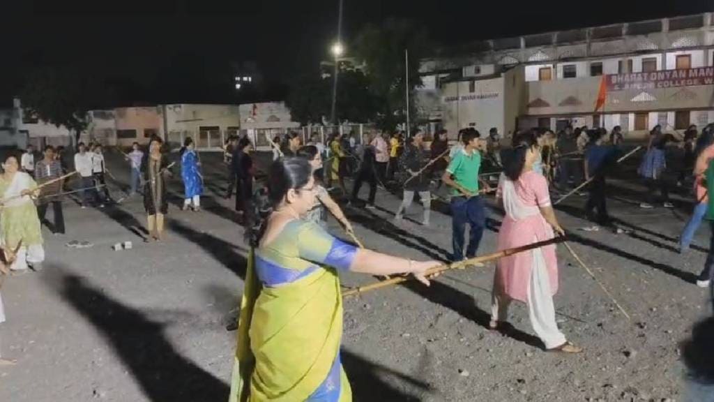 Why do women practice sword and stick fighting at night in Wardha news