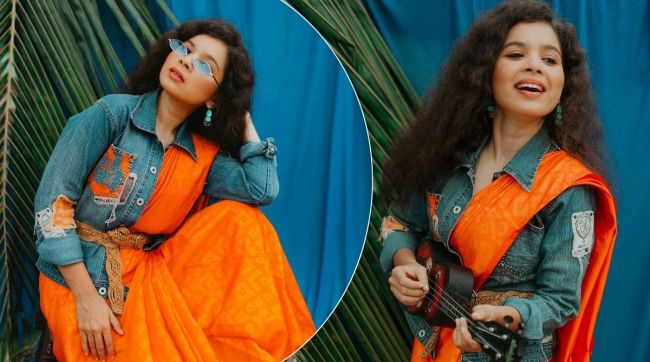 bhagyashree milind new look with saffron color saree denim jacket and goggles photos share on istagram