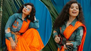 bhagyashree milind new look with saffron color saree denim jacket and goggles photos share on istagram