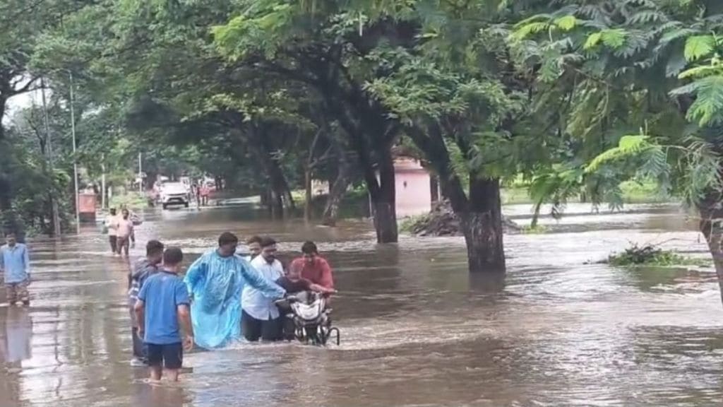 heavy rain floods baramati indapur villages canal breaches bridge sinks flooding